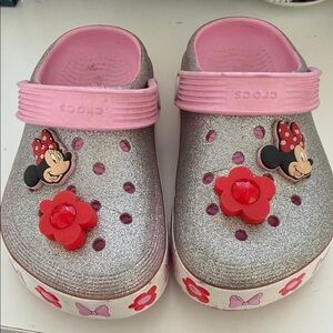 CROCS Kids Glitter Clogs with Pink Trim and Red Flower Charms